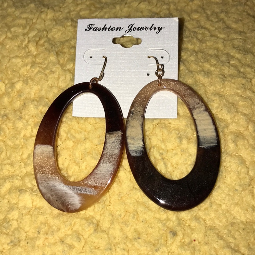 Woman’s hoop earring’s, 2 1/2 inch long.